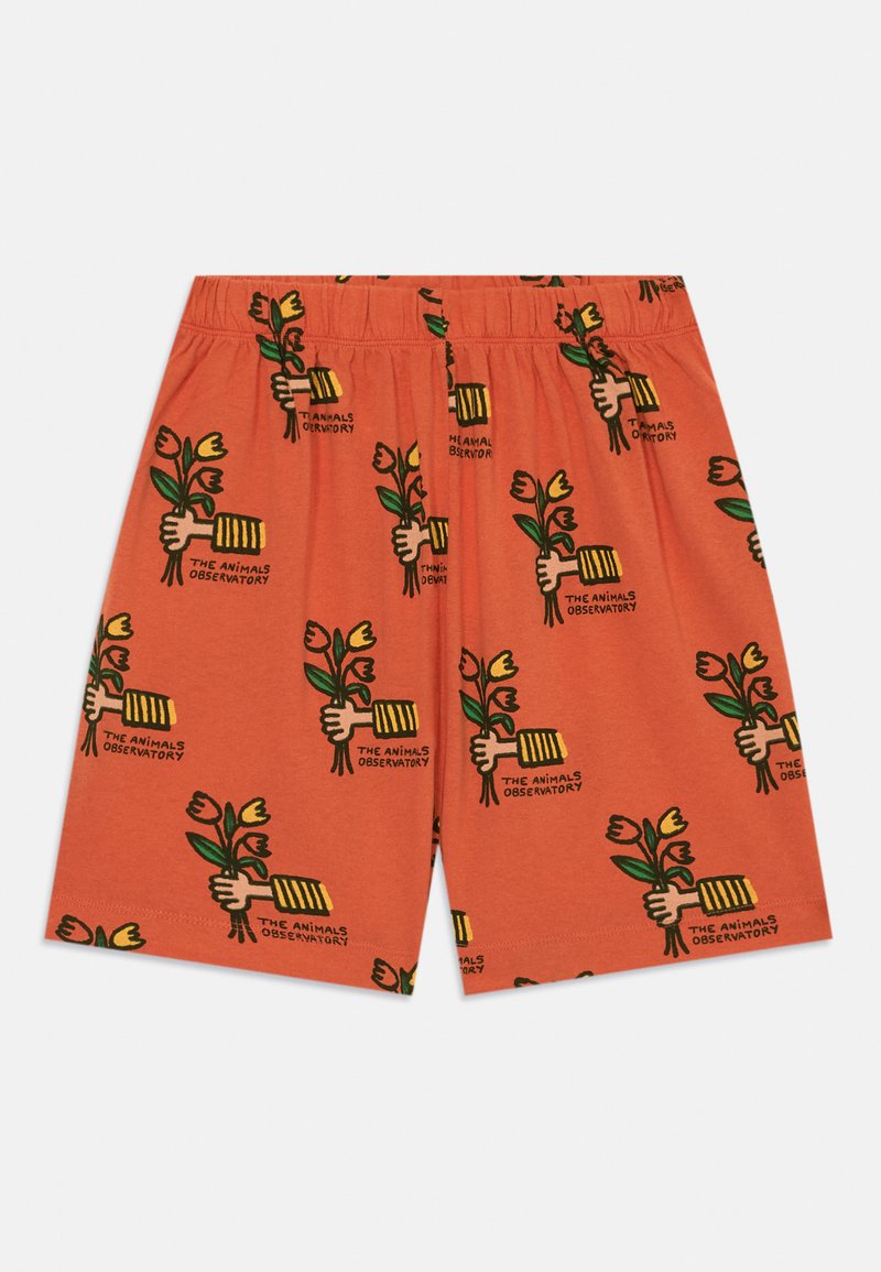 Orangene Baumwollshorts mit einem sich wiederholenden Muster von Händen, die Blumen halten, und Text. Sie haben einen lässigen Schnitt und einen elastischen Bund.