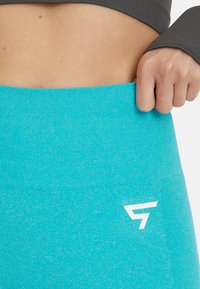 SQUATPROOF ROW SEAMLESS - Shorts - turquoise