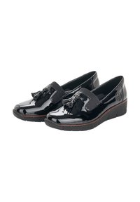 Mocassins noirs à enfiler avec une finition brillante, ornés de franges, dotés de côtés élastiques, de semelles en caoutchouc et d'un emblème décoratif en rond au talon.