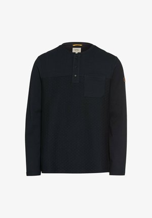 Dunkelblaues Langarmshirt mit einer strukturierten Oberseite, Halsauschnitt mit drei Knöpfen und einer Brusttasche auf der linken Seite. Weicher Stoff.