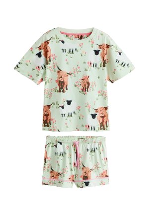 Gyermek rövid ujjú felső és rövidnadrág szett világoszöld háttérrel, nyomtatott rózsaszín virágokkal, barna tehenekkel és fehér birkákkal.