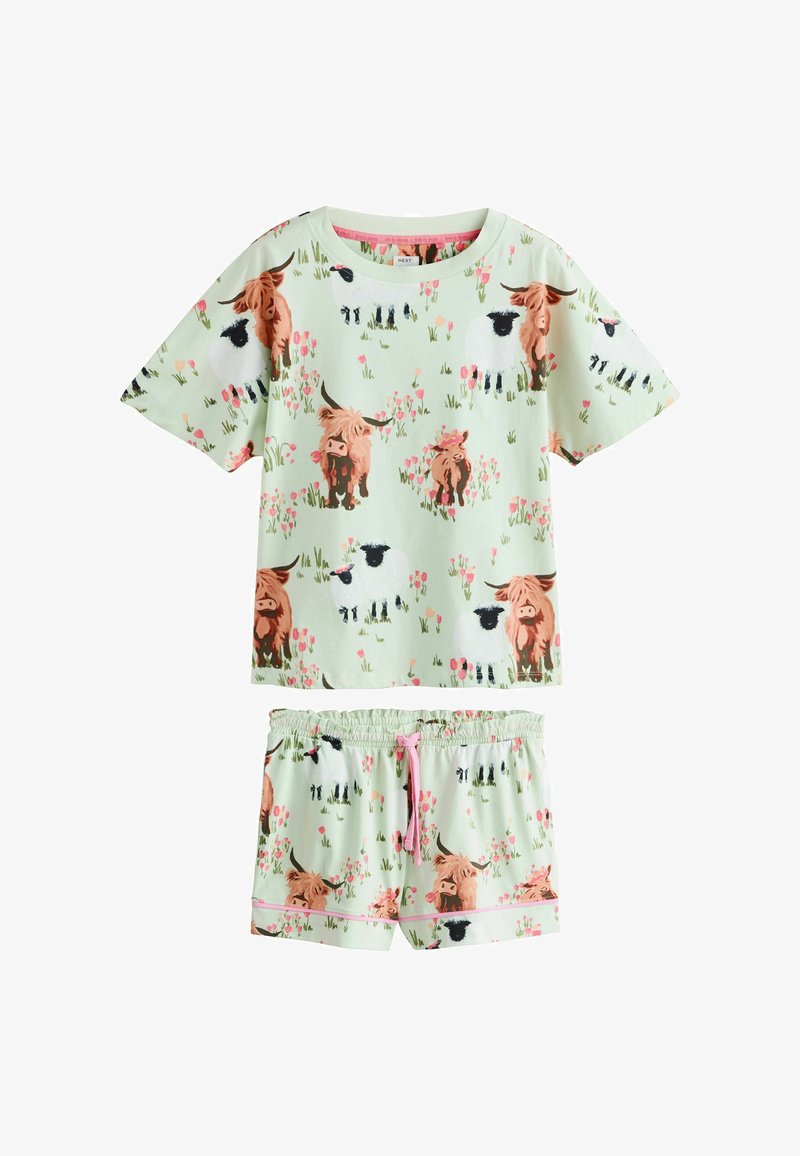 Set pentru copii format din bluză cu mâneci scurte și pantaloni scurți, cu un fundal verde deschis, decorat cu flori roz imprimate, vaci maro și oi albe.