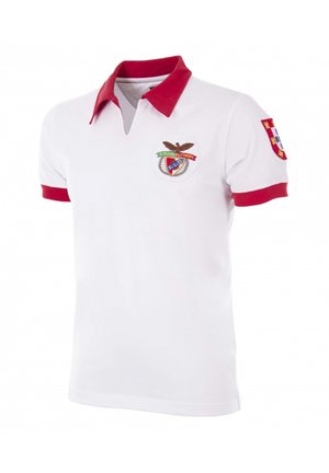 Witte polo met een rode kraag en manchetten. Bevat een geborduurd embleem met een adelaar en een kleurrijk symbool op de borst.