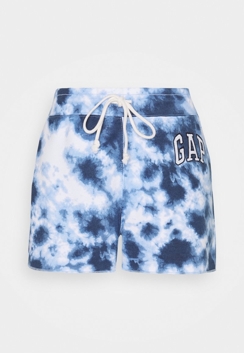 Shorts tie-dye bleu et blanc avec une taille élastique blanche à cordon de serrage et le logo "GAP" sur le côté droit.