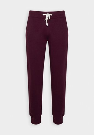 Bordeaux sweatpants lavet af blød stof, med en elastisk talje med hvid snor, tapered ben og ribbede manchetter.