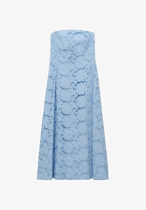 Light blue strapless dress made of textured fabric with floral cut-out patterns, flowing design down to the floor. No visible fasteners.
