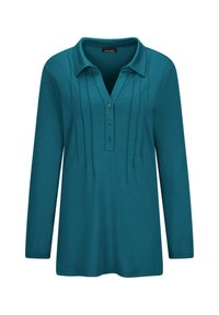 Camicia a maniche lunghe di colore turchese con colletto, apertura con bottoni e pieghe verticali sul davanti. Tessuto morbido con un design a vestibilità rilassata.