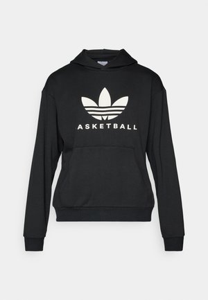 Felpa nera con cappuccio caratterizzata da un grande logo bianco con una design a tre foglie e il testo "BASKETBALL". Realizzata in un tessuto morbido con tasca frontale.