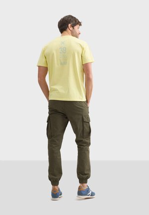 HERITAGE - T-shirt print - pale yellow