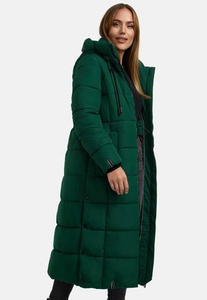 Long green puffer coat with a hood, featuring quilted texture, front buttons, and black accents. Styled for warmth and coverage.