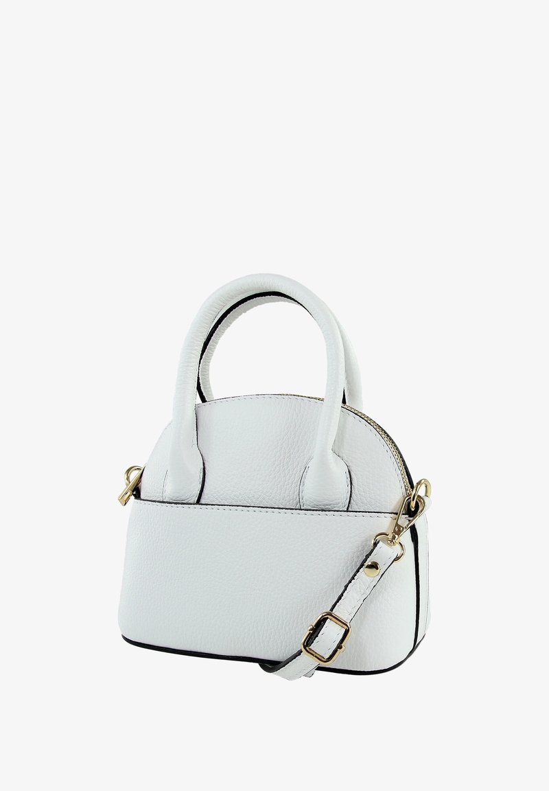 White leather handbag with dual handles, removable shoulder strap, zip closure, and contrasting black trim. Smooth texture and compact shape.