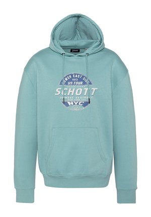 Sudadera de color verde claro con un bolsillo frontal, capucha con cordón y un gráfico circular impreso que presenta "Schott" y detalles de ubicación. Material suave.