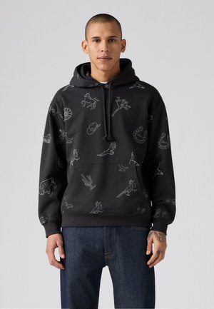Zwarte hoodie van katoen, met witte lijntekeningen van dieren, planten en objecten. Kangoeroezak en verstelbare capuchon.