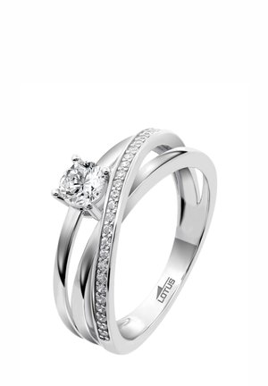 Silver ring featuring a central round diamond, with an intertwined band and a side row of smaller diamonds for added detail.