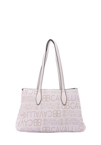 Witte totebag met gouden logo print, met twee lange hengsels en zwarte accenten. Gestructureerd materiaal met een vlak ontwerp. Ritssluiting aan de bovenkant.