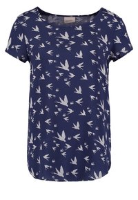 Námořnická modrá tričko s krátkým rukávem a stříbrným potiskem ptáka. Měkká tkanina, kulatý výstřih a mírně zakřivený lem. Pohodlný, volný střih.