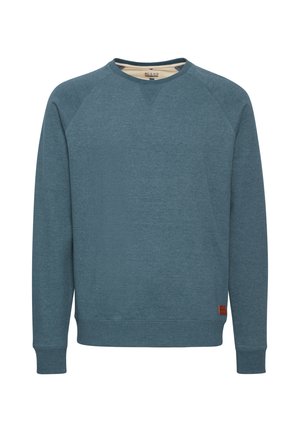 Modrá bavlněná mikina s dlouhými rukávy, kulatým výstřihem a žebrovanými manžetami. Má jemnou strukturu a malou hnědou textilní nášivku na lemu.