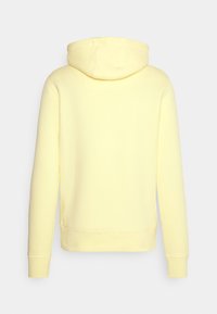 Felpa con cappuccio gialla chiara, misto cotone-poliestere, polsini e orlo a coste, design semplice, senza grafiche o decorazioni, vista posteriore.