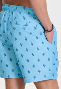 Shiwi Swimming shorts - blue sky sketched coral