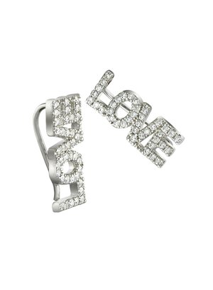 Silver earrings featuring the word "LOVE" with sparkling clear crystals, showcasing a bold, modern design with distinct letter shapes.