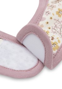 Bloemprint stof in zachte pastelkleuren met een roze trim. Inclusief een textuur velcro sluiting voor een veilige bevestiging.