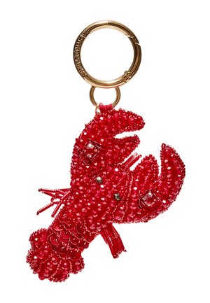 Porte-clés anneau doré avec breloque détaillée en forme de homard rouge recouverte de petites perles et de sequins.