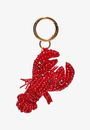 Porte-clés anneau doré avec breloque détaillée en forme de homard rouge recouverte de petites perles et de sequins.