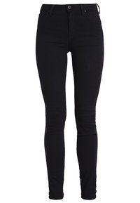 Pantalones vaqueros negros ajustados de denim, con una cintura alta, diseño clásico de cinco bolsillos y cierre de botón. Textura suave, forma ajustada.