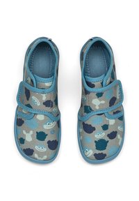 Blue and gray children's shoes with a patterned fabric featuring various shapes and cartoon faces, secured with a hook-and-loop strap.