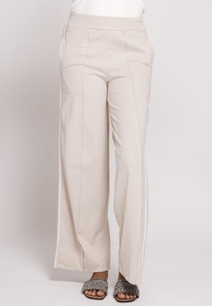DEENA - Tracksuit bottoms - sand
