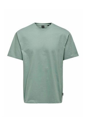 Mint green cotton t-shirt with short sleeves, round neckline, and a relaxed fit. Features a small brand label on the side.