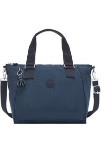 Mørkeblå nylon håndtaske med dobbelte håndtag og justerbar skulderrem. Har et rundt logo patch og en dekorativ charm. Glat tekstur.