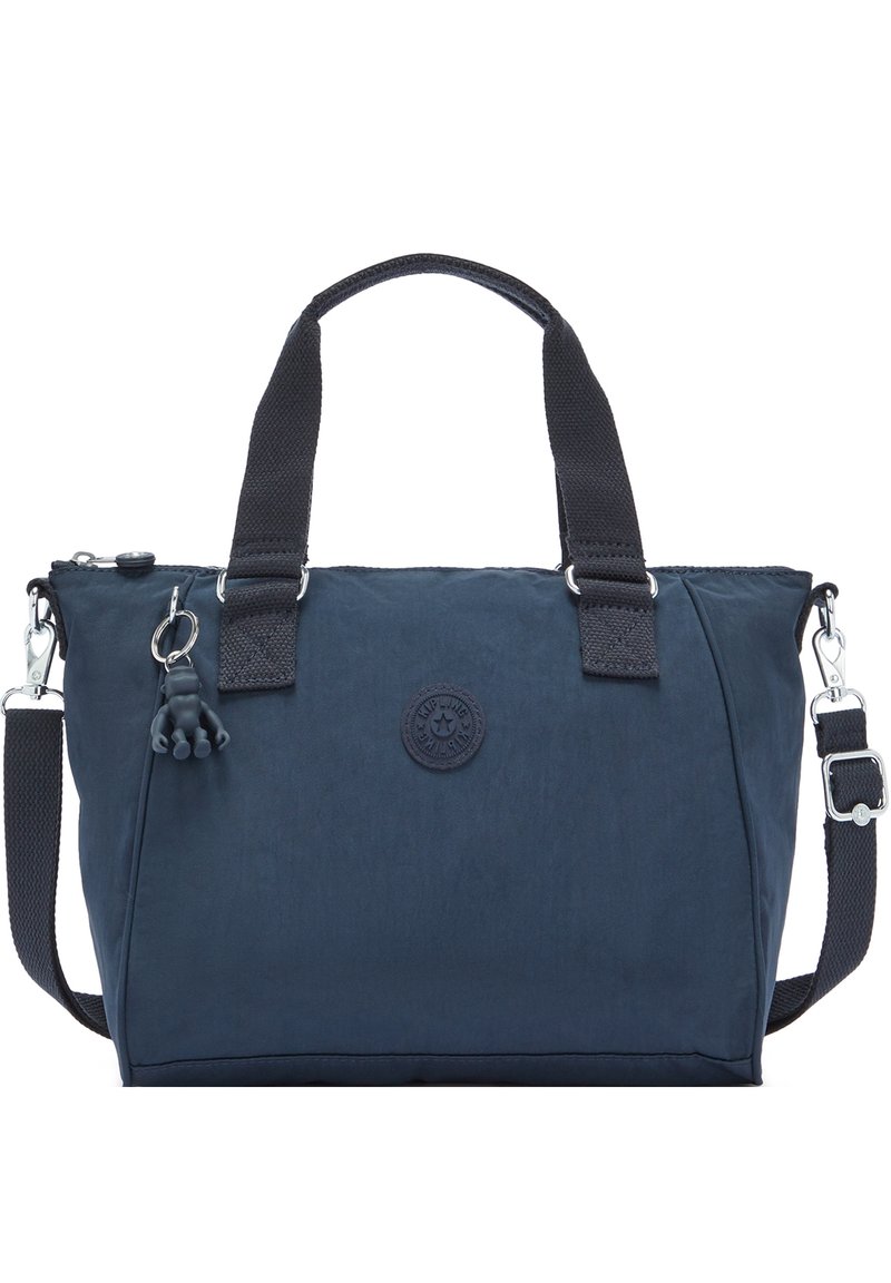 Mørkeblå nylon håndtaske med dobbelte håndtag og justerbar skulderrem. Har et rundt logo patch og en dekorativ charm. Glat tekstur.