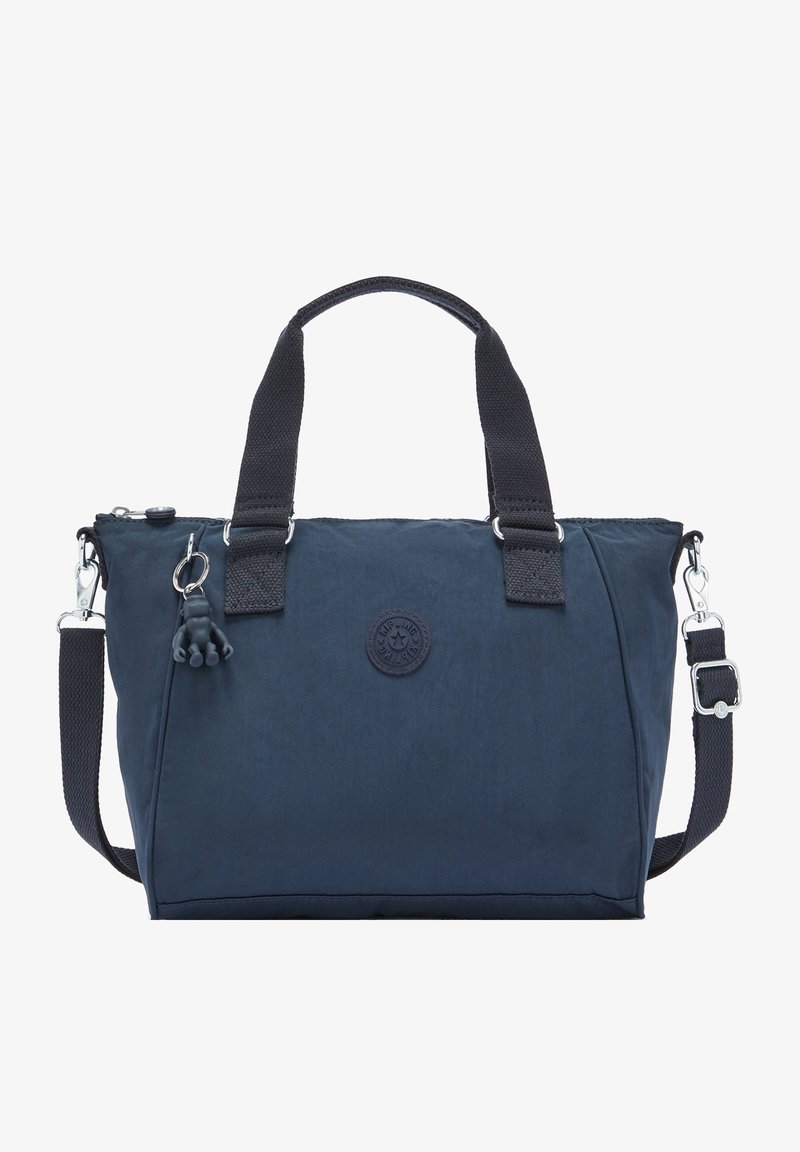 Mørkeblå nylon håndtaske med dobbelte håndtag og justerbar skulderrem. Har et rundt logo patch og en dekorativ charm. Glat tekstur.