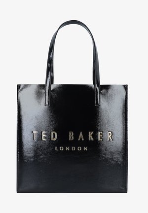 Sac cabas noir brillant Ted Baker London avec deux anses et le nom de la marque embossé en or centré sur le devant.