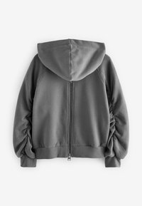 Graue Kapuzenjacke mit Reißverschluss, langen gerafften Ärmeln sowie gerippten Bündchen und Saum, von hinten auf weißem Hintergrund gezeigt.