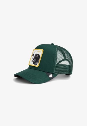 Green cap with mesh back, featuring a square patch of a black-and-white cow and the word "CASH" in yellow stitching.