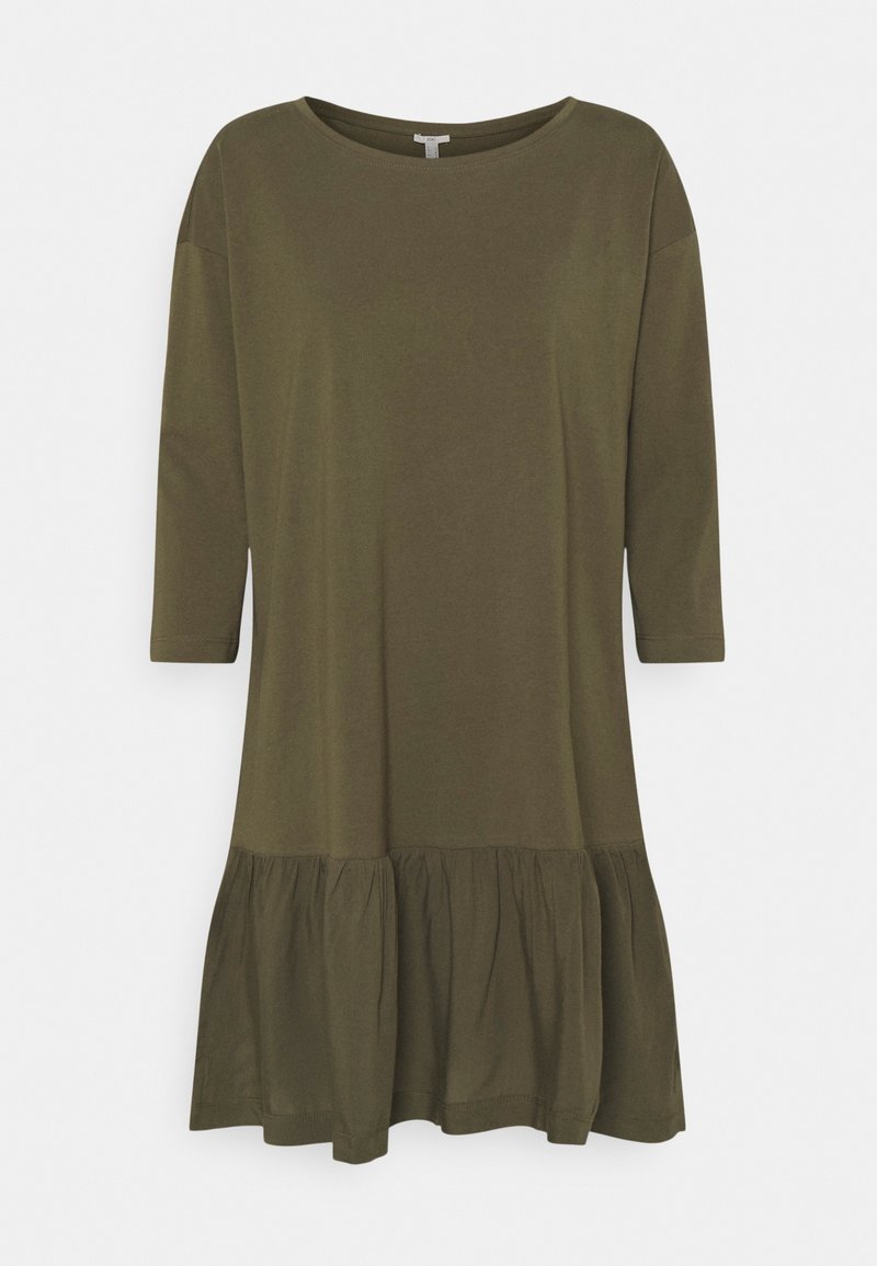 Olivi vihreä puuvillamekko, jossa on kolme neljännesosaa hihat, pyöreä pääntie ja röyhelöinen alareuna. Pehmeä rakenne ja rento istuvuus.