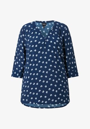 Blusa blu navy con motivi circolari astratti bianchi, maniche a tre quarti, scollo rotondo e due bottoni sulla patta frontale.