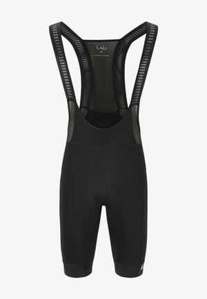 Cuissard de vélo noir avec bretelles en mesh respirant, rembourrage au niveau de l'assise et tissu lisse et extensible. Présente un design minimaliste sans logos visibles.