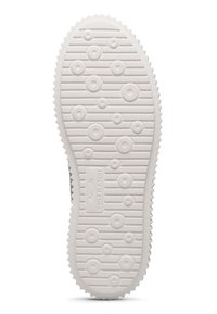White rubber sneaker sole with textured ridges and circular patterns for grip. Features a brand label embossed on the bottom.