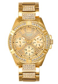 Gold-tone Guess watch with a textured metal band, embellished with rhinestones. Features multiple sub-dials and prominent hour markers.