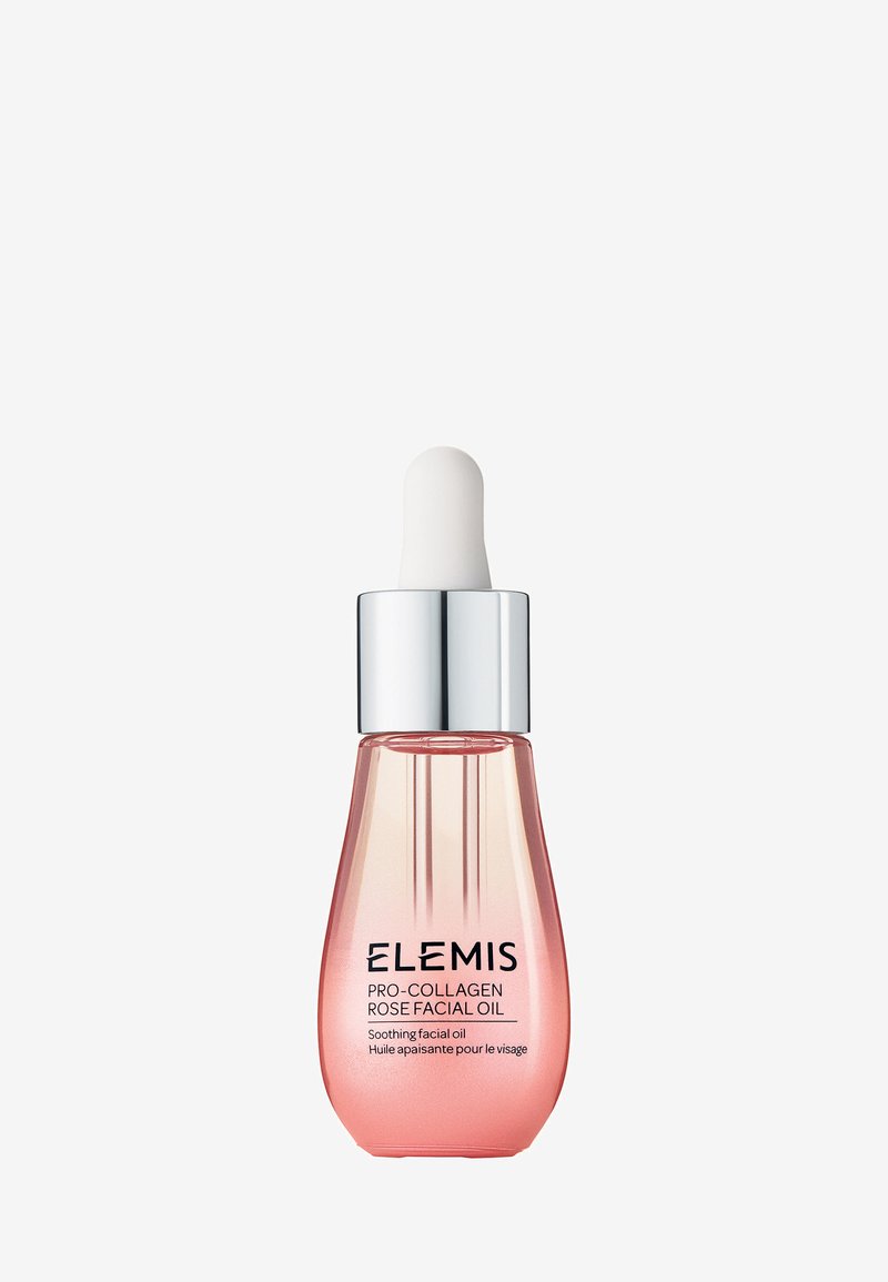 Elemis Pro-Collagen Rose Facial Oil i en rosa glassflaske med sølvlokk og hvit dråpeteller på en ensfarget bakgrunn.