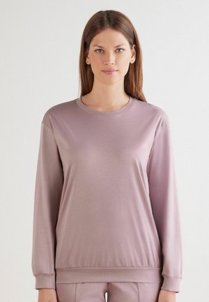 Helllila Langarm-Sweatshirt mit rundem Ausschnitt und gerippten Bündchen, aus einem glatten, dehnbaren Stoff und mit einem lockeren Schnitt.