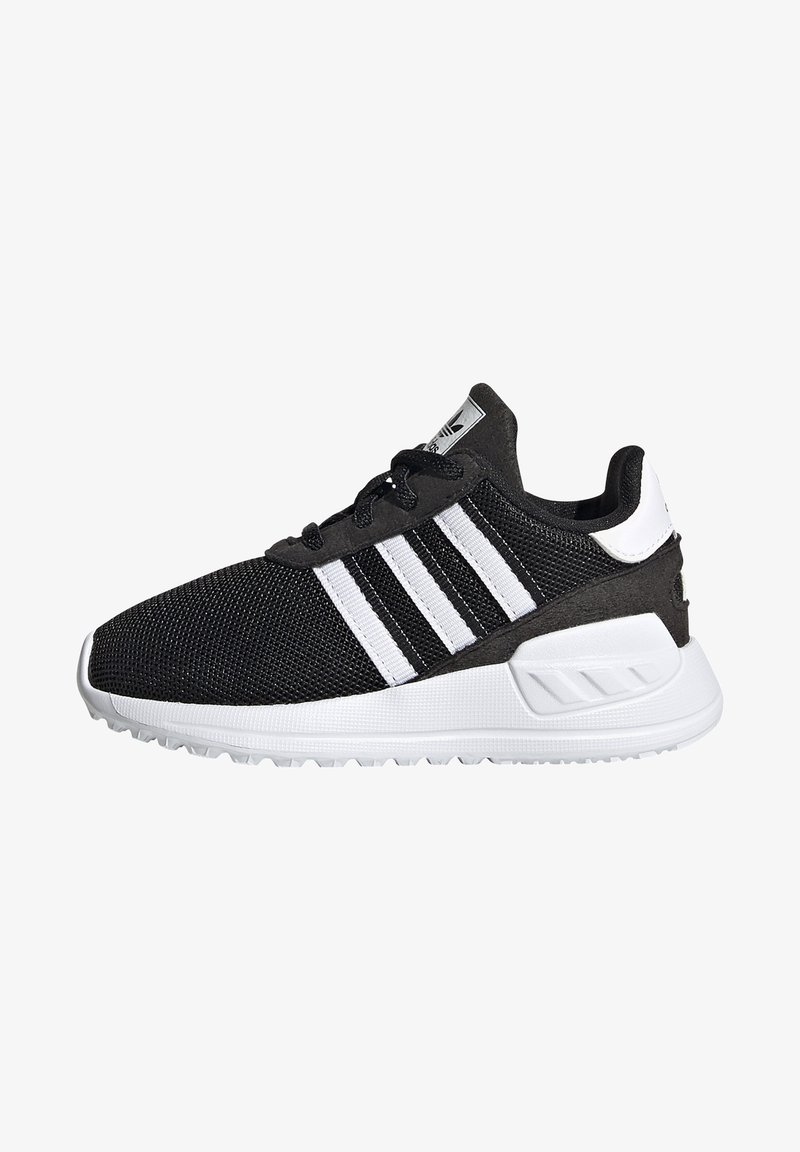Black athletic shoes with a mesh upper, white three-stripe design, padded collar, and a white rubber sole with textured detailing.