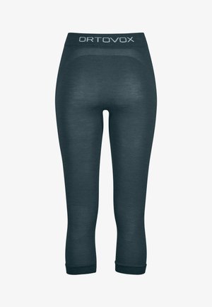 Dark grey, knee-length leggings made of soft material. Features a wide waistband with "ORTOVOX" branding and textured patterns on the legs.