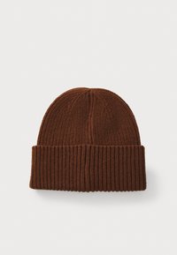 Brown knitted beanie with a ribbed texture, featuring a folded cuff. The fabric appears thick and warm, suitable for cold weather.