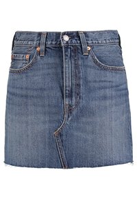 Jeanskjol i blått med fransad nederkant, dragkedja och knappstängning, framfickor och kontrasterande sömmar. Har en figurnära silhuett.