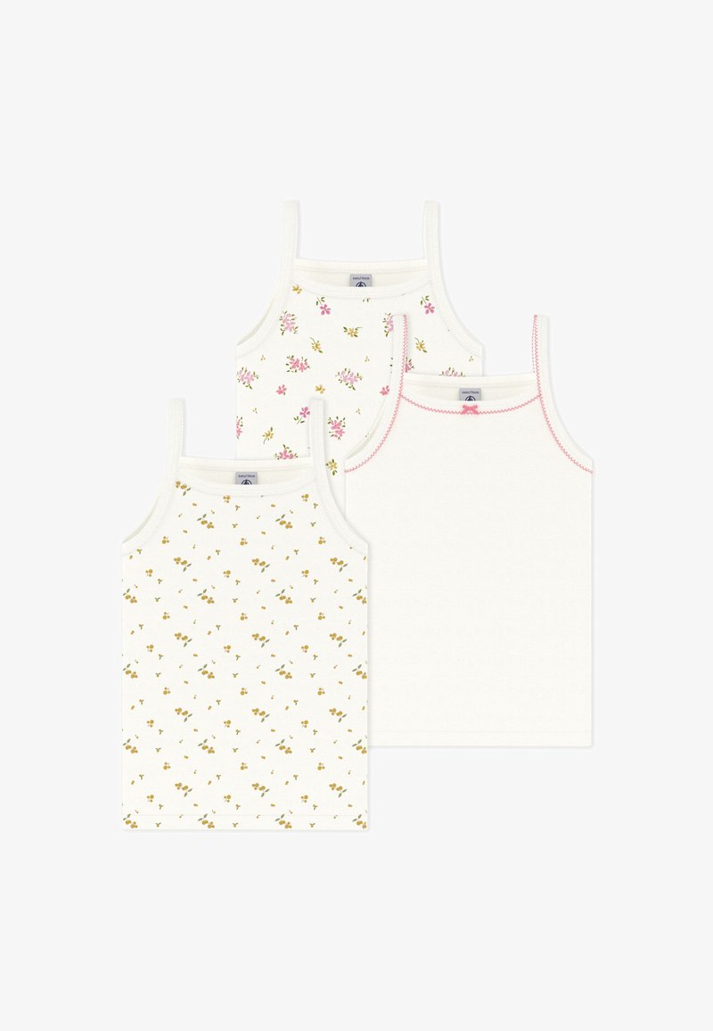 Σετ από τρία λευκά αμάνικα μπλουζάκια με λουλουδάτα σχέδια σε ροζ και κίτρινο, με λεπτές τιράντες και αντίθετες ραφές.