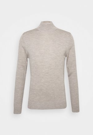Light beige turtleneck sweater made of soft knit fabric, featuring long sleeves and a fitted silhouette without patterns or embellishments.